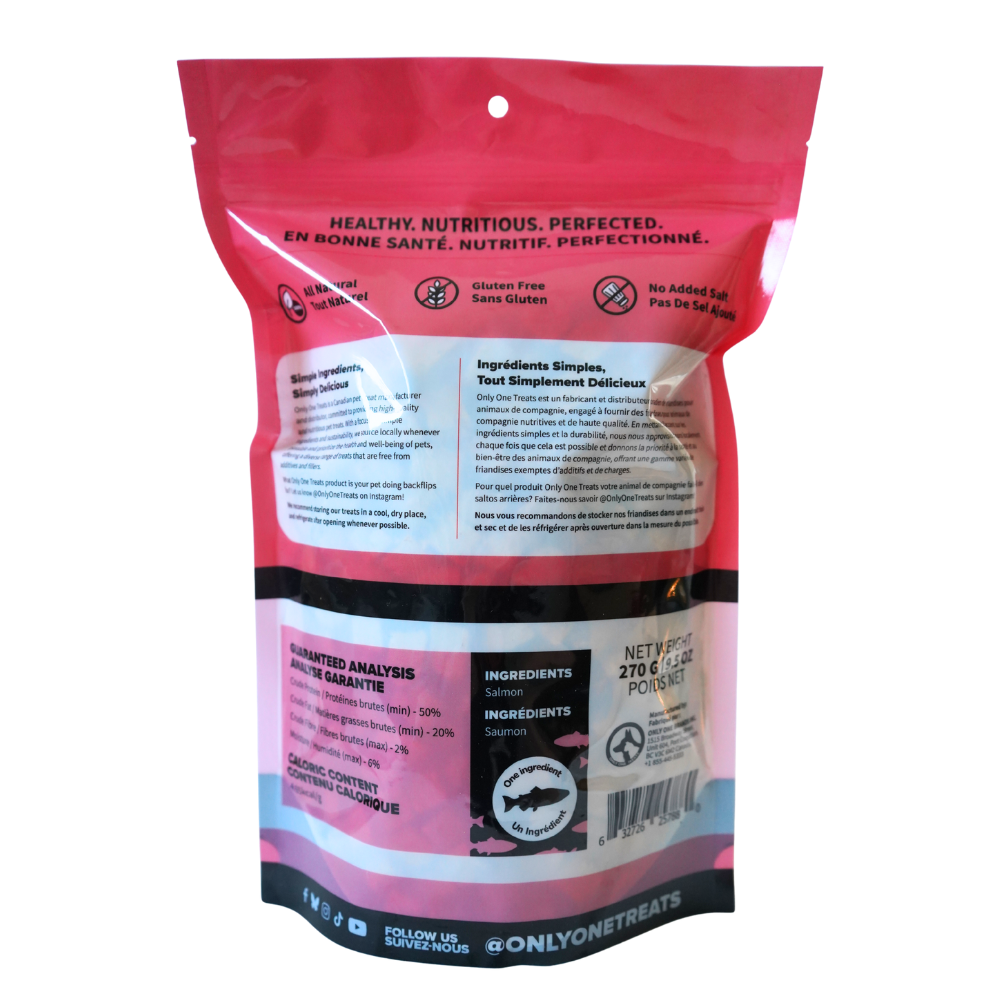 Back view of a pink pet treat package with text and branding on a white background